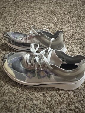 Brand new.  Women's White Floral Nike Lace-Up Athletic Sneakers